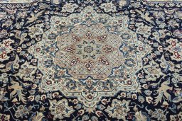 Central medallion detail of 1970s Nain rug from Iran / Persia