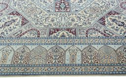 Corner detail of 1970s Nain rug showing border pattern and Cork pile