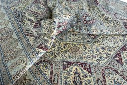 Surface texture of 1970s Nain rug with natural Cork and intricate pattern