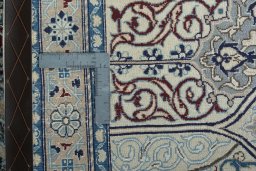 Backside of handmade 1970s Nain rug showing knot structure and weave density