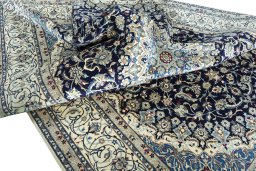 Surface texture of 1970s Nain rug with natural Cork and intricate pattern