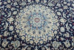 Central medallion detail of 1970s Nain rug from Iran / Persia
