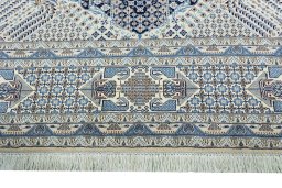 Corner detail of 1970s Nain rug showing border pattern and Wool pile