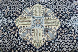 Central medallion detail of 1970s Nain rug from Iran / Persia