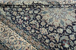 Close-up detail of 2000s Nain rug from Iran / Persia showing Wool weave