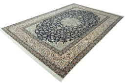 Corner detail of 2000s Nain rug showing border pattern and Wool pile