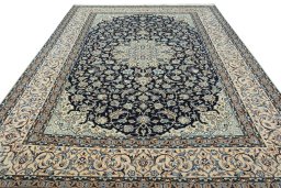 Surface texture of 2000s Nain rug with natural Wool and intricate pattern