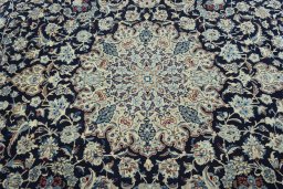 Central medallion detail of 2000s Nain rug from Iran / Persia