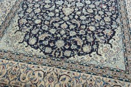 Close-up detail of 2000s Nain rug from Iran / Persia showing Wool weave