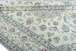 Close-up detail of 2000s Nain rug from Iran / Persia showing Wool weave