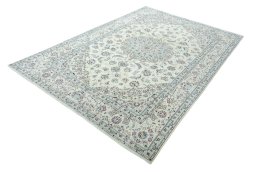 Corner detail of 2000s Nain rug showing border pattern and Wool pile