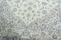 Close-up detail of 2000s Nain rug from Iran / Persia showing Wool weave