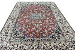 Surface texture of 2000s Nain rug with natural Wool and intricate pattern