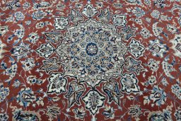 Central medallion detail of 2000s Nain rug from Iran / Persia