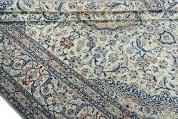 Close-up detail of 2000s Nain rug from Iran / Persia showing Wool weave