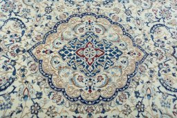 Central medallion detail of 2000s Nain rug from Iran / Persia