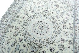 Backside of handmade 2000s Nain rug showing knot structure and weave density