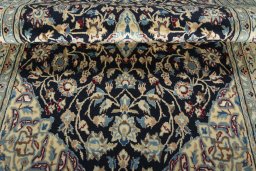 Close-up detail of 2000s Nain rug from Iran / Persia showing Wool weave