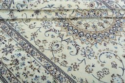Close-up detail of 2000s Nain rug from Iran / Persia showing Wool weave