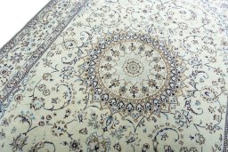 Backside of handmade 2000s Nain rug showing knot structure and weave density