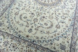 Close-up detail of 2000s Nain rug from Iran / Persia showing Wool weave