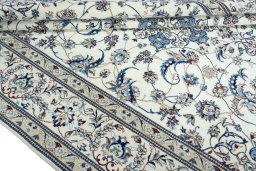 Close-up detail of New Nain rug from Iran / Persia showing Wool weave