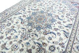 Backside of handmade New Nain rug showing knot structure and weave density