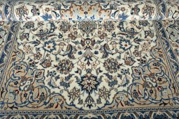 Close-up detail of 2000s Nain rug from Iran / Persia showing Wool weave