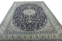 Surface texture of 2000s Nain rug with natural Wool and intricate pattern