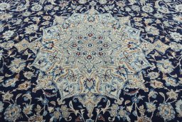 Central medallion detail of 2000s Nain rug from Iran / Persia