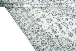 Close-up detail of 2000s Nain rug from Iran / Persia showing Wool weave