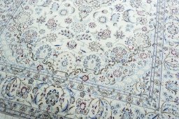 Close-up detail of 2000s Nain rug from Iran / Persia showing Wool weave