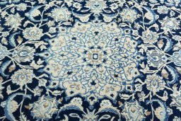 Central medallion detail of 2000s Nain rug from Iran / Persia