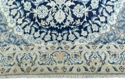 Close-up detail of 2000s Nain rug from Iran / Persia showing Wool weave