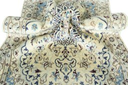 Close-up detail of 2000s Nain rug from Iran / Persia showing Wool weave