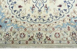 Close-up detail of 2000s Nain rug from Iran / Persia showing Wool weave