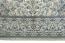 Central medallion detail of 1970s Nain rug from Iran / Persia