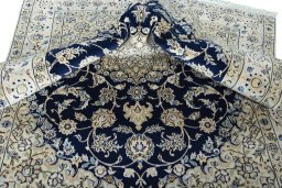 Close-up detail of New Nain rug from Iran / Persia showing Wool weave