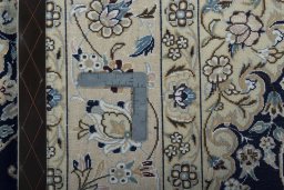 Surface texture of New Nain rug with natural Wool and intricate pattern