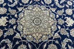 Central medallion detail of New Nain rug from Iran / Persia