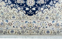 Close-up detail of New Nain rug from Iran / Persia showing Wool weave