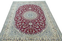 Surface texture of 2000s Nain rug with natural Wool and intricate pattern