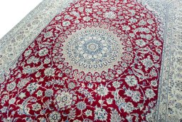 Backside of handmade 2000s Nain rug showing knot structure and weave density