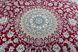 Central medallion detail of 2000s Nain rug from Iran / Persia