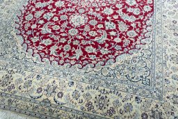 Close-up detail of 2000s Nain rug from Iran / Persia showing Wool weave