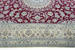 Corner detail of 2000s Nain rug showing border pattern and Wool pile