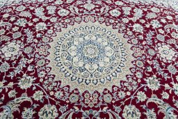 Central medallion detail of 2000s Nain rug from Iran / Persia