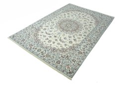 Corner detail of 2000s Nain rug showing border pattern and Wool pile