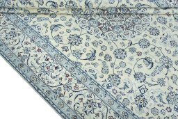 Close-up detail of 2000s Nain rug from Iran / Persia showing Wool weave