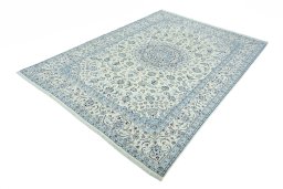 Corner detail of 2000s Nain rug showing border pattern and Wool pile